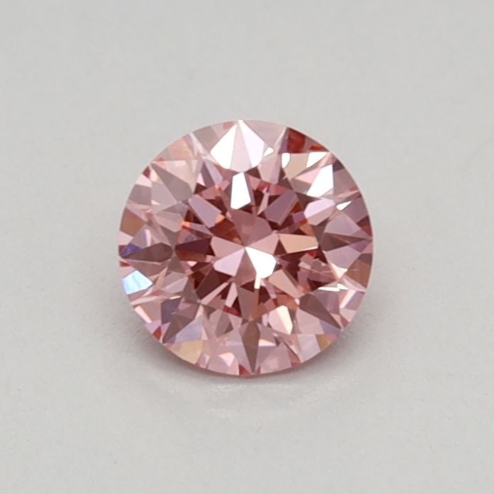 Loose Diamond - ROUND 0.31ct Fancy Vivid Pink VS1: Loose Diamond - ROUND 0.31ct Fancy Vivid Pink VS1 Source: This is a real non-mined Diamond that has been grown in a lab Shape: ROUND Carats: 0.31 Color: Fancy Vivid Pink Certification: IGI Video: