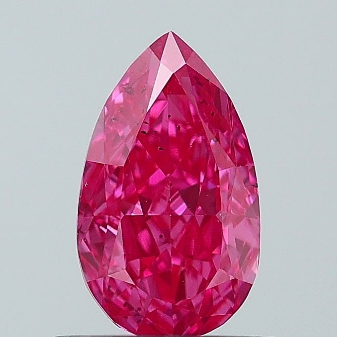 Loose Diamond - PEAR 0.9ct Fancy Vivid Pink SI1: Loose Diamond - PEAR 0.9ct Fancy Vivid Pink SI1 Source: This is a real non-mined Diamond that has been grown in a lab Shape: PEAR Carats: 0.9 Color: Fancy Vivid Pink Certification: NONE Video: Video