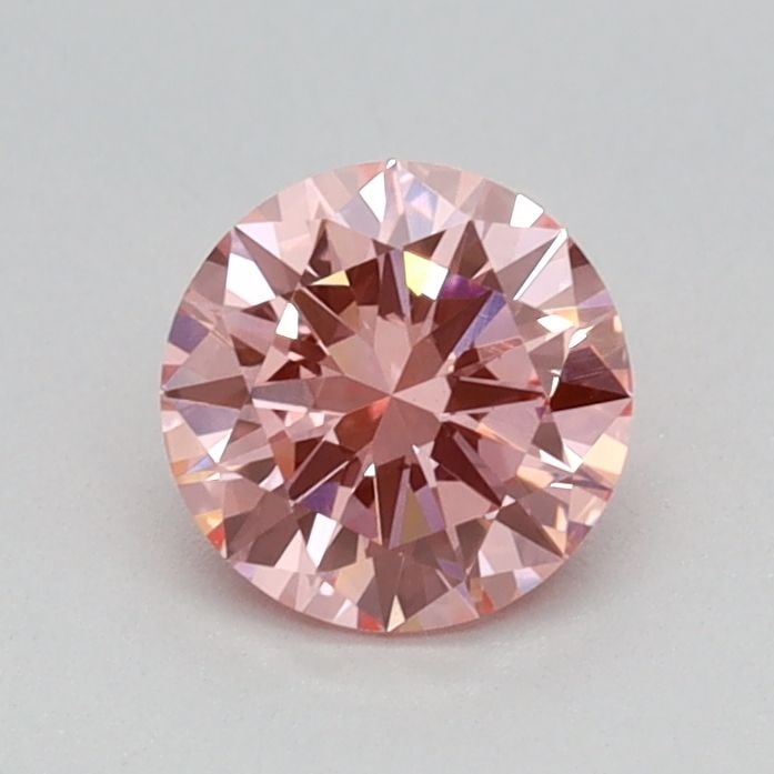 Loose Diamond - ROUND 0.47ct Fancy Vivid Pink VVS2: Loose Diamond - ROUND 0.47ct Fancy Vivid Pink VVS2 Source: This is a real non-mined Diamond that has been grown in a lab Shape: ROUND Carats: 0.47 Color: Fancy Vivid Pink Certification: IGI Video:
