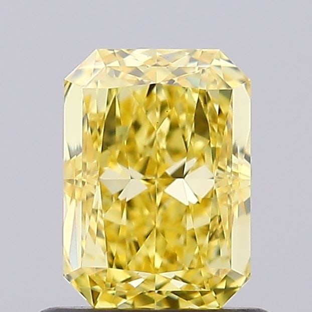 Loose Diamond - RADIANT 1.0ct Fancy Vivid Yellow VS1: Loose Diamond - RADIANT 1.0ct Fancy Vivid Yellow VS1 Source: This is a real non-mined Diamond that has been grown in a lab Shape: RADIANT Carats: 1.0 Color: Fancy Vivid Yellow Certification: IGI Video