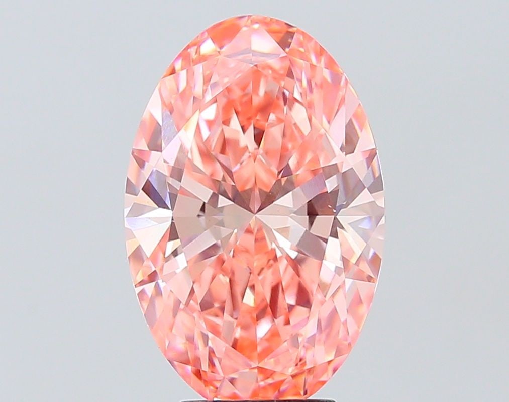 Loose Diamond - OVAL 5.09ct Fancy Vivid Pink VS1: Loose Diamond - OVAL 5.09ct Fancy Vivid Pink VS1 Source: This is a real non-mined Diamond that has been grown in a lab Shape: OVAL Carats: 5.09 Color: Fancy Vivid Pink Certification: IGI Video: