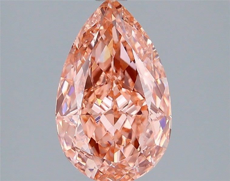 Loose Diamond - PEAR 2.15ct Fancy Vivid Orangey Pink VVS2: Loose Diamond - PEAR 2.15ct Fancy Vivid Orangey Pink VVS2 Source: This is a real non-mined Diamond that has been grown in a lab Shape: PEAR Carats: 2.15 Color: Fancy Vivid Orangey Pink Certification: 