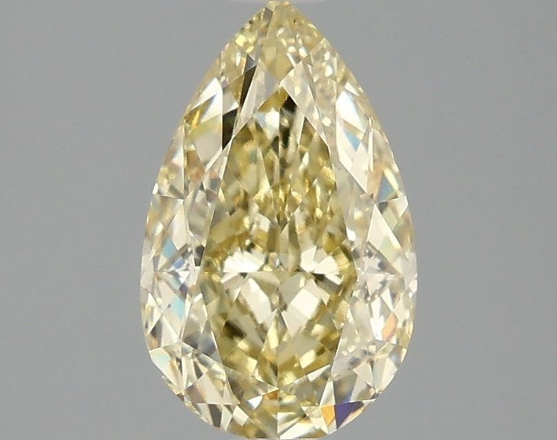 Loose Diamond - PEAR 1.56ct Fancy Yellow VS1: Loose Diamond - PEAR 1.56ct Fancy Yellow VS1 Source: This is a real non-mined Diamond that has been grown in a lab Shape: PEAR Carats: 1.56 Color: Fancy Yellow Certification: IGI Video: