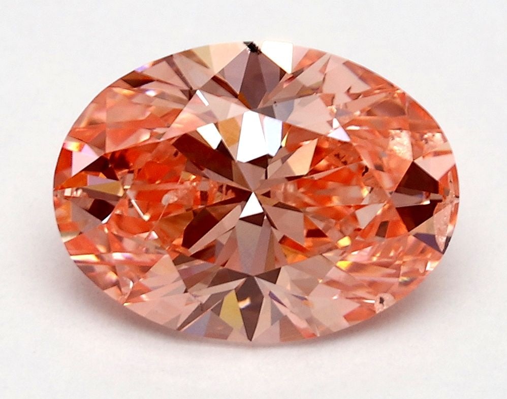 Loose Diamond - OVAL 2.0ct Fancy Vivid Pink SI2: Loose Diamond - OVAL 2.0ct Fancy Vivid Pink SI2 Source: This is a real non-mined Diamond that has been grown in a lab Shape: OVAL Carats: 2.0 Color: Fancy Vivid Pink Certification: IGI Video: