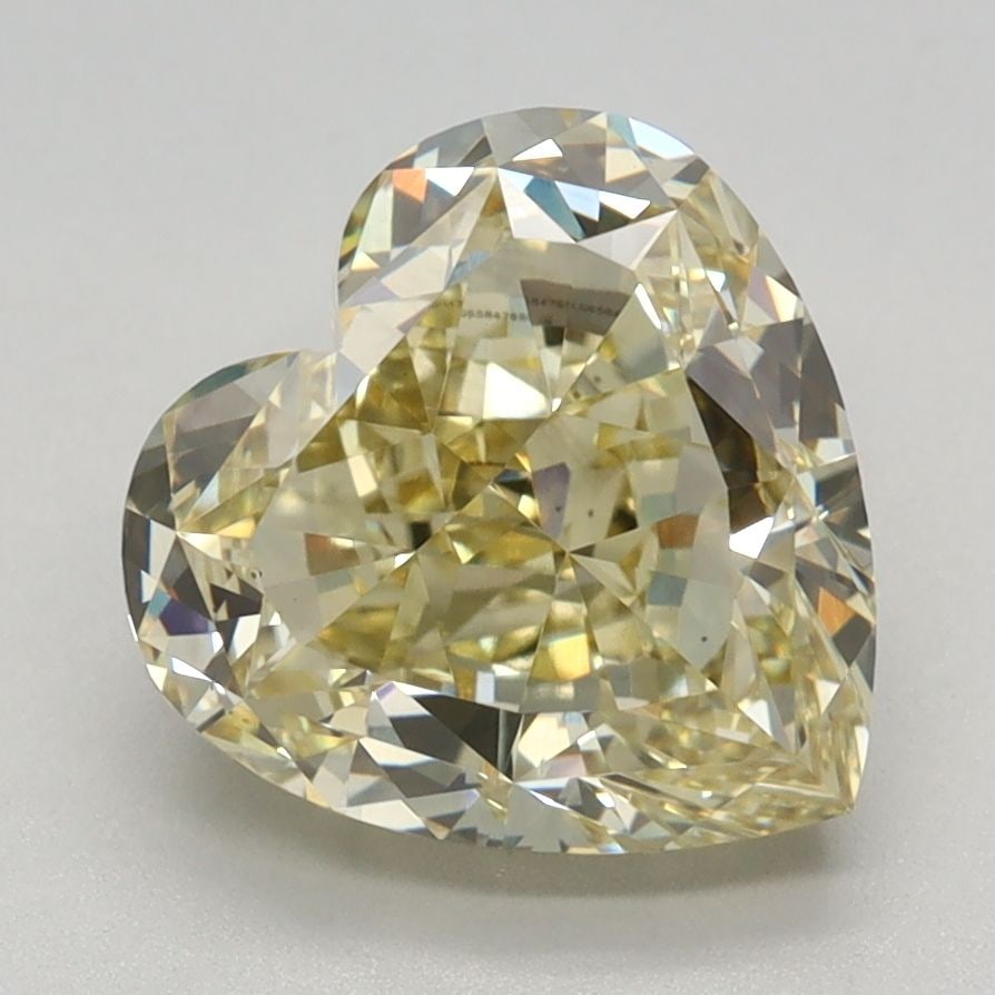 Loose Diamond - HEART 2.68ct Fancy Light Yellow VS1: Loose Diamond - HEART 2.68ct Fancy Light Yellow VS1 Source: This is a real non-mined Diamond that has been grown in a lab Shape: HEART Carats: 2.68 Color: Fancy Light Yellow Certification: IGI Video: