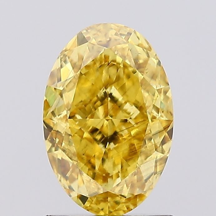Loose Diamond - OVAL 1.41ct Fancy Vivid Yellow SI1: Loose Diamond - OVAL 1.41ct Fancy Vivid Yellow SI1 Source: This is a real non-mined Diamond that has been grown in a lab Shape: OVAL Carats: 1.41 Color: Fancy Vivid Yellow Certification: IGI Video: