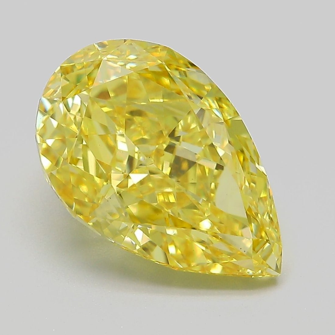 Loose Diamond - PEAR 6.05ct Fancy Vivid Yellow VS1: Loose Diamond - PEAR 6.05ct Fancy Vivid Yellow VS1 Source: This is a real non-mined Diamond that has been grown in a lab Shape: PEAR Carats: 6.05 Color: Fancy Vivid Yellow Certification: IGI Video: