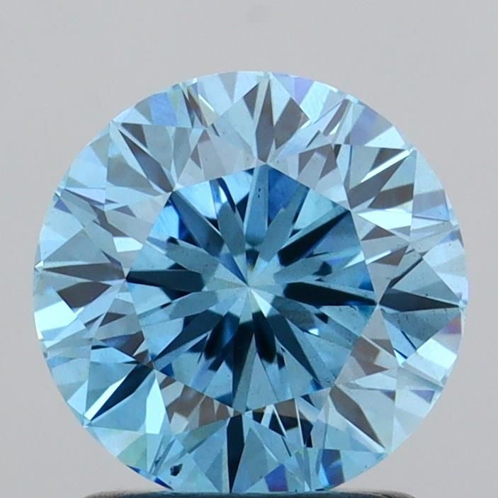 Loose Diamond - ROUND 1.47ct Fancy Vivid Blue VS2: Loose Diamond - ROUND 1.47ct Fancy Vivid Blue VS2 Source: This is a real non-mined Diamond that has been grown in a lab Shape: ROUND Carats: 1.47 Color: Fancy Vivid Blue Certification: IGI Video: