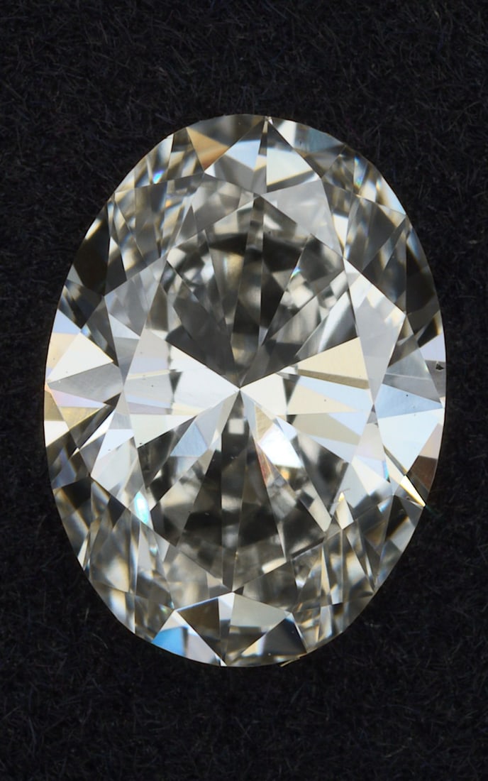 Loose Diamond - OVAL 0.7ct I VS2: Loose Diamond - OVAL 0.7ct I VS2 Source: This is a real non-mined Diamond that has been grown in a lab Shape: OVAL Carats: 0.7 Color: I Clarity: VS2 Certification: IGI Video: