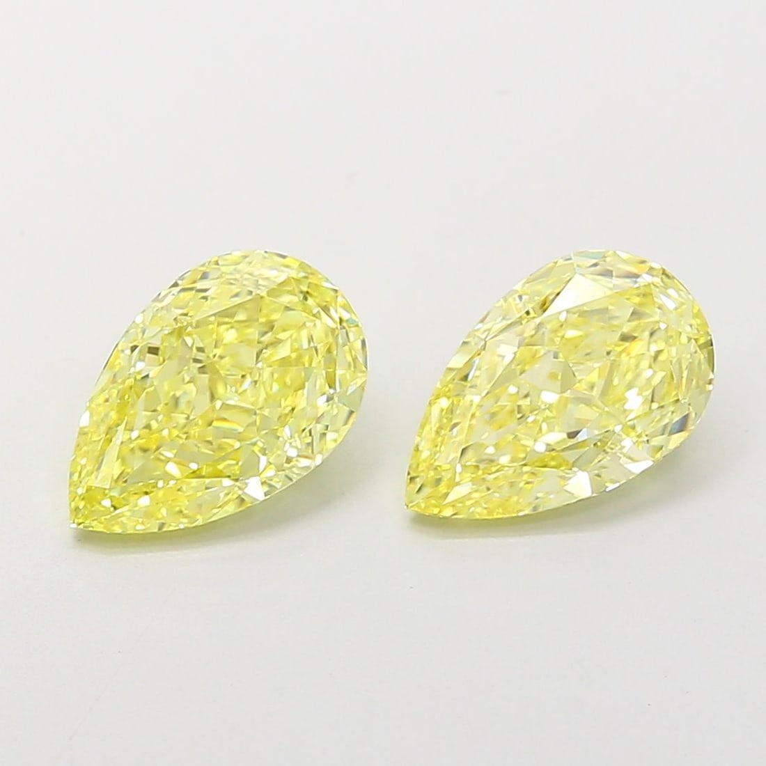 Loose Diamond - PEAR 2.06ct Fancy Intense Yellow VVS2: Loose Diamond - PEAR 2.06ct Fancy Intense Yellow VVS2 Source: This is a real non-mined Diamond that has been grown in a lab Shape: PEAR Carats: 2.06 Color: Fancy Intense Yellow Certification: IGI Vide