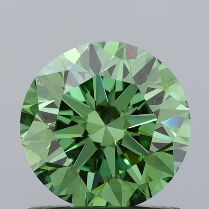 Loose Diamond - ROUND 0.92ct Fancy Vivid Green VS1: Loose Diamond - ROUND 0.92ct Fancy Vivid Green VS1 Source: This is a real non-mined Diamond that has been grown in a lab Shape: ROUND Carats: 0.92 Color: Fancy Vivid Green Certification: IGI Video: