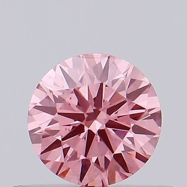 Loose Diamond - ROUND 0.39ct Fancy Vivid Pink SI1: Loose Diamond - ROUND 0.39ct Fancy Vivid Pink SI1 Source: This is a real non-mined Diamond that has been grown in a lab Shape: ROUND Carats: 0.39 Color: Fancy Vivid Pink Certification: IGI Video: