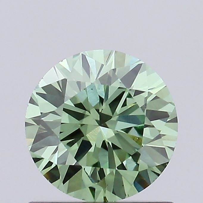 Loose Diamond - ROUND 0.69ct Fancy Vivid Green VS1: Loose Diamond - ROUND 0.69ct Fancy Vivid Green VS1 Source: This is a real non-mined Diamond that has been grown in a lab Shape: ROUND Carats: 0.69 Color: Fancy Vivid Green Certification: IGI Video: