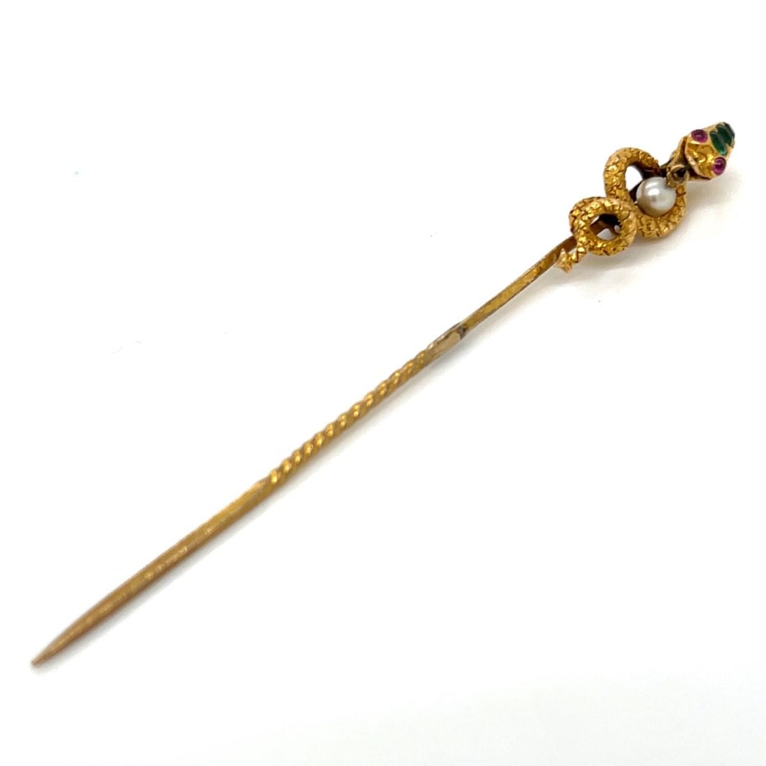 Antique Yellow Gold Snake Pin with Natural Pearl and Ruby Eyes: Antique Yellow Gold Snake Pin with Natural Pearl and Ruby Eyes This Victorian-era snake pin is crafted from 18K and 14K yellow gold and set with a natural pearl. The head features either demantoid gar