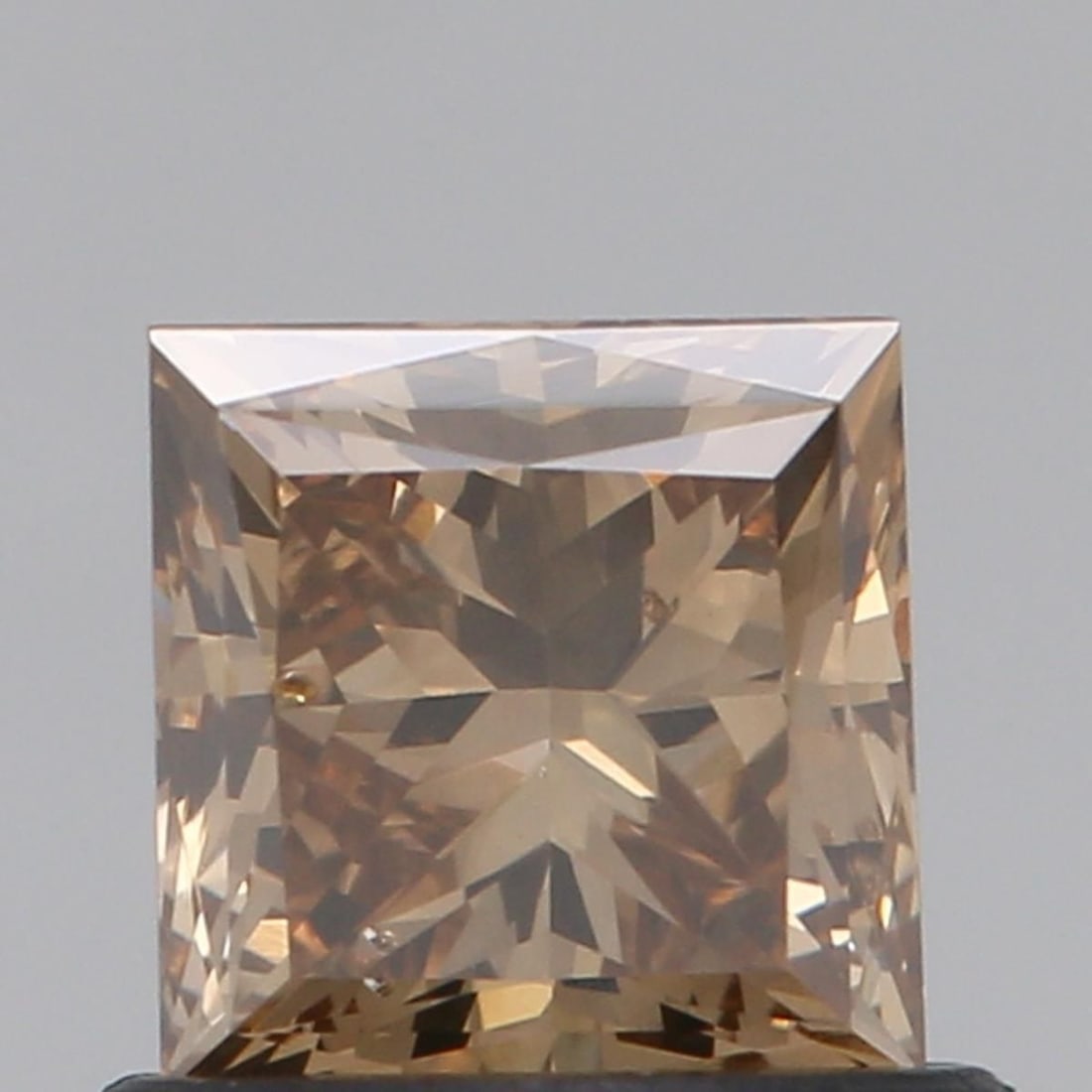 Loose Diamond - PRINCESS 0.75ct Fancy Brown VS2: Loose Diamond - PRINCESS 0.75ct Fancy Brown VS2 Source: Natural Shape: PRINCESS Carats: 0.75 Color: Fancy Brown Certification: NONE Video: