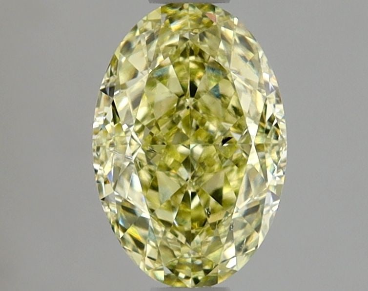 Loose Diamond - OVAL 1.02ct Fancy Yellow SI1: Loose Diamond - OVAL 1.02ct Fancy Yellow SI1 Source: Natural Shape: OVAL Carats: 1.02 Color: Fancy Yellow Certification: GIA Video: