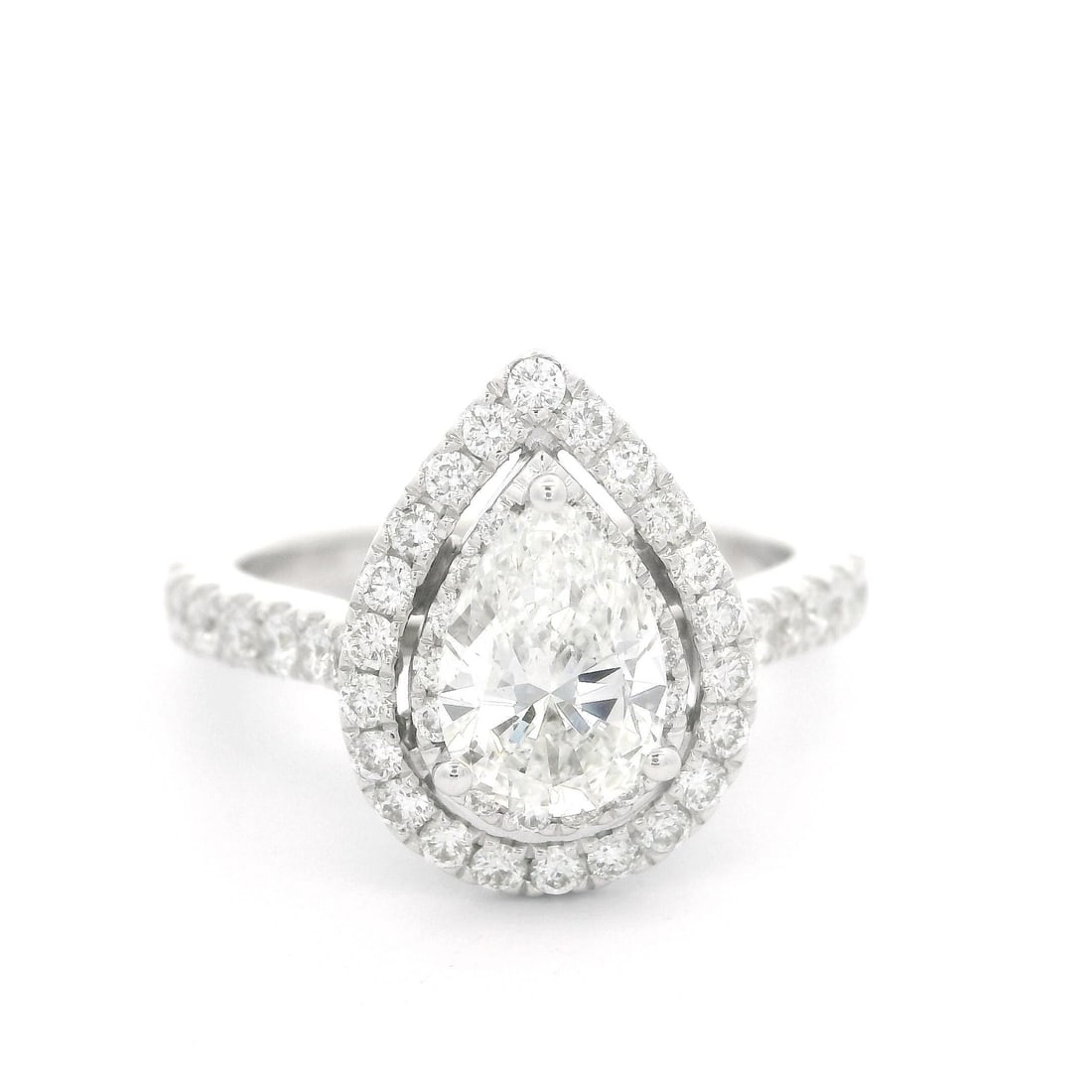 Vera Wang Love 14K White Gold Pear Diamond Halo Engagement Ring: Vera Wang Love 14K White Gold Pear Diamond Halo Engagement Ring This exquisite engagement ring from the Vera Wang "Love" Collection features a stunning pear-shaped diamond at its center, weighing 0.99