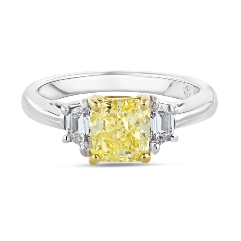 1.51ct GIA Fancy Intense Yellow Diamond Platinum Ring with Trapezoid Accents: 1.51ct GIA Fancy Intense Yellow Diamond Platinum Ring with Trapezoid Accents This stunning engagement ring features a radiant cut fancy yellow diamond at its center, weighing 1.51 carats and graded by