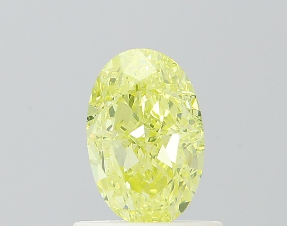 Loose Diamond - OVAL 0.91ct Fancy Intense Greenish Yellow SI1: Loose Diamond - OVAL 0.91ct Fancy Intense Greenish Yellow SI1 Source: Natural Shape: OVAL Carats: 0.91 Color: Fancy Intense Greenish Yellow Certification: GIA Video: