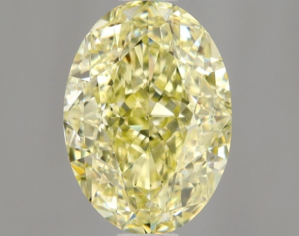 Loose Diamond - OVAL 1.07ct Fancy Light Yellow VS2: Loose Diamond - OVAL 1.07ct Fancy Light Yellow VS2 Source: Natural Shape: OVAL Carats: 1.07 Color: Fancy Light Yellow Certification: GIA Video: