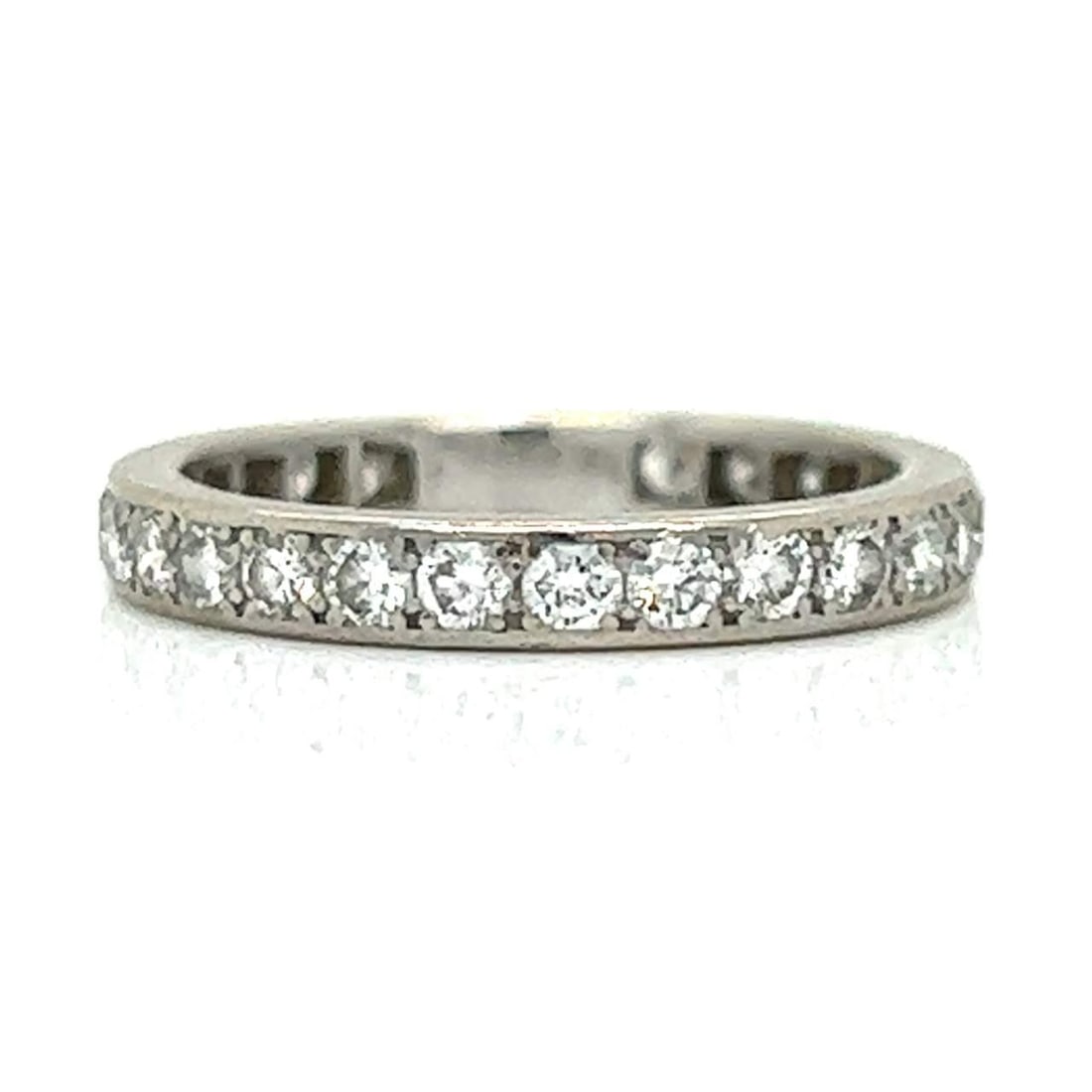 Platinum Diamond Band 1.40 Ct 26 Diamonds F-G VVS-VS: Platinum Diamond Band 1.40 Ct 26 Diamonds F-G VVS-VS This exquisite platinum diamond band features a total weight of approximately 1.40 carats, showcasing 26 dazzling diamonds. The diamonds are of F-G