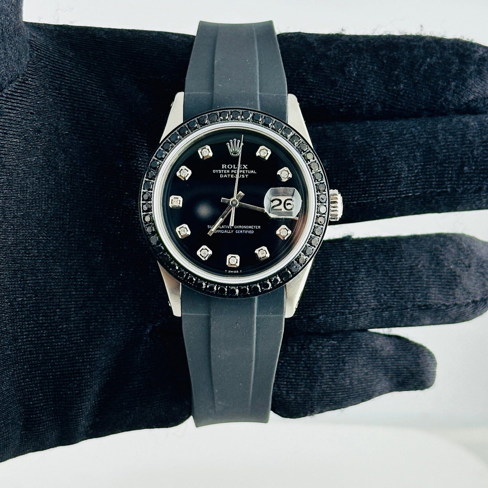 Datejust Ref 1603 Mens Watch With Aftermarket Black Diamond Dial and Rubber Strap: Datejust Ref 1603 Mens Watch With Aftermarket Black Diamond Dial and Rubber Strap This Rolex Datejust features an aftermarket black diamond dial and a pave black diamond bezel, complemented by an afte