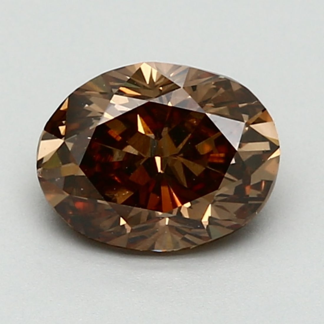 Loose Diamond - OVAL 1.61ct Fancy Dark Orange Brown VS1: Loose Diamond - OVAL 1.61ct Fancy Dark Orange Brown VS1 Source: Natural Shape: OVAL Carats: 1.61 Color: Fancy Dark Orange Brown Certification: GIA PLEASE NOTE: Framed, Large, or heavy items do not hav