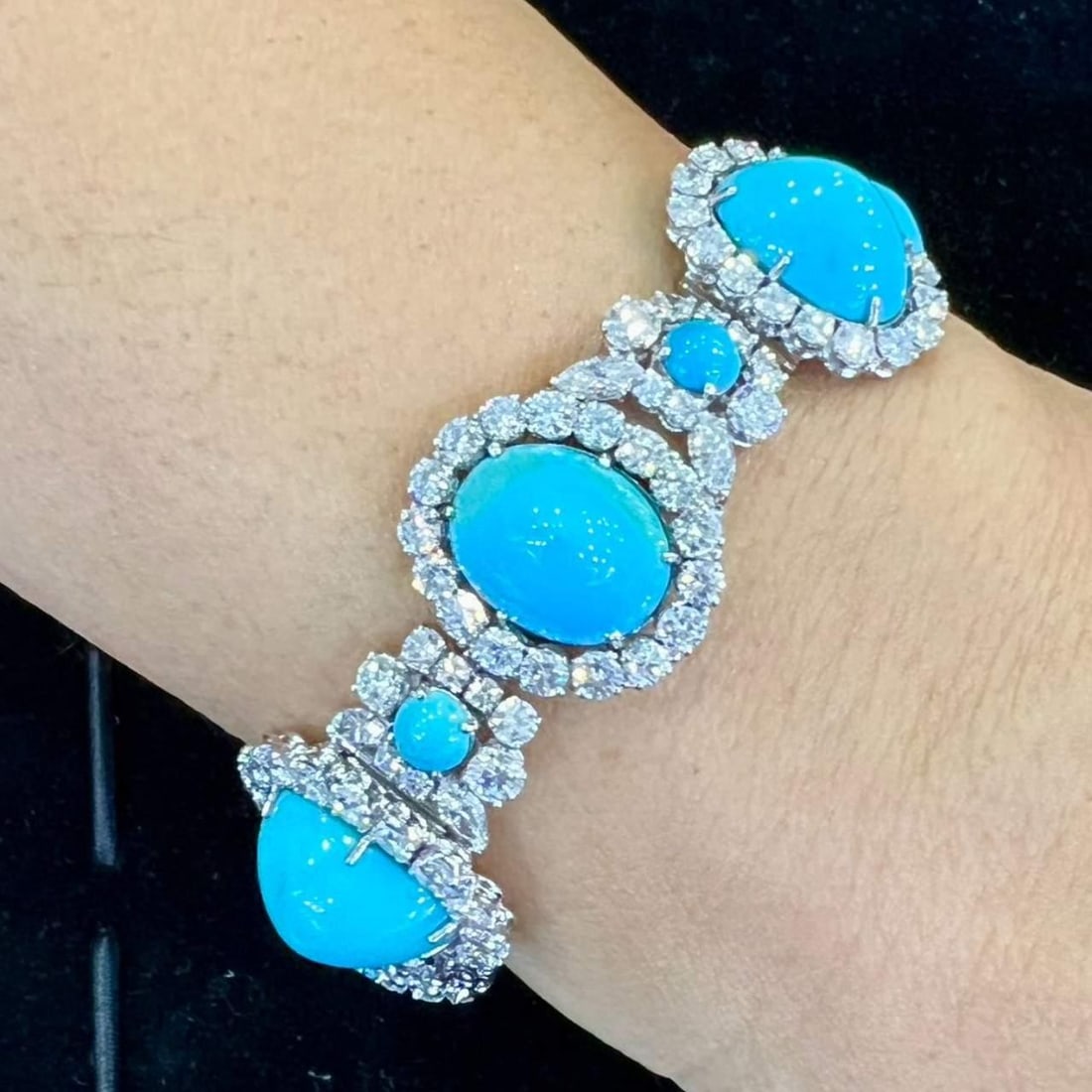 1960's Platinum Bracelet with Persian Turquoise and 175 Diamonds: 1960's Platinum Bracelet with Persian Turquoise and 175 Diamonds This exquisite 1960's bracelet showcases a stunning combination of Persian turquoise and sparkling diamonds, elegantly crafted in plati