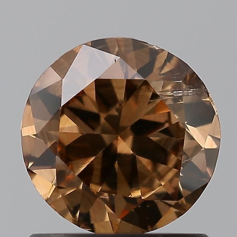 Loose Diamond - ROUND 0.85ct Brown SI1: Loose Diamond - ROUND 0.85ct Brown SI1 Source: Natural Shape: ROUND Carats: 0.85 Color: Brown Certification: NONE Video: