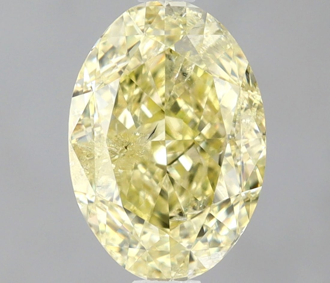 Loose Diamond - OVAL 1.0ct Fancy Yellow I2: Loose Diamond - OVAL 1.0ct Fancy Yellow I2 Source: Natural Shape: OVAL Carats: 1.0 Color: Fancy Yellow Certification: GIA Video: