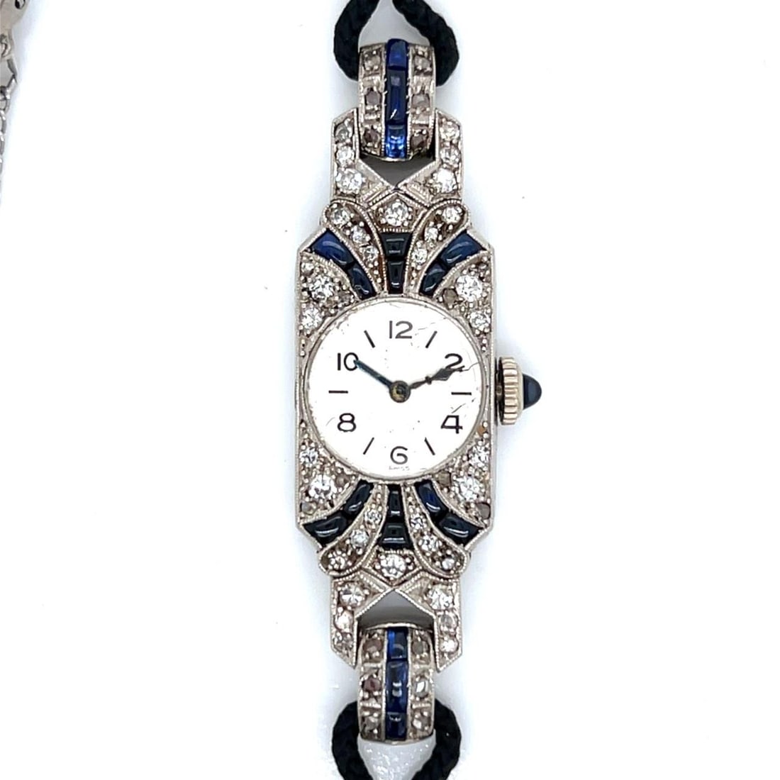 Platinum Art Deco Watch with Diamonds and Sapphires Manual Wind: Platinum Art Deco Watch with Diamonds and Sapphires Manual Wind This Art Deco watch features a platinum case adorned with 54 diamonds totaling approximately 1.20 carats, with G-I color and VS1-SI2 cla