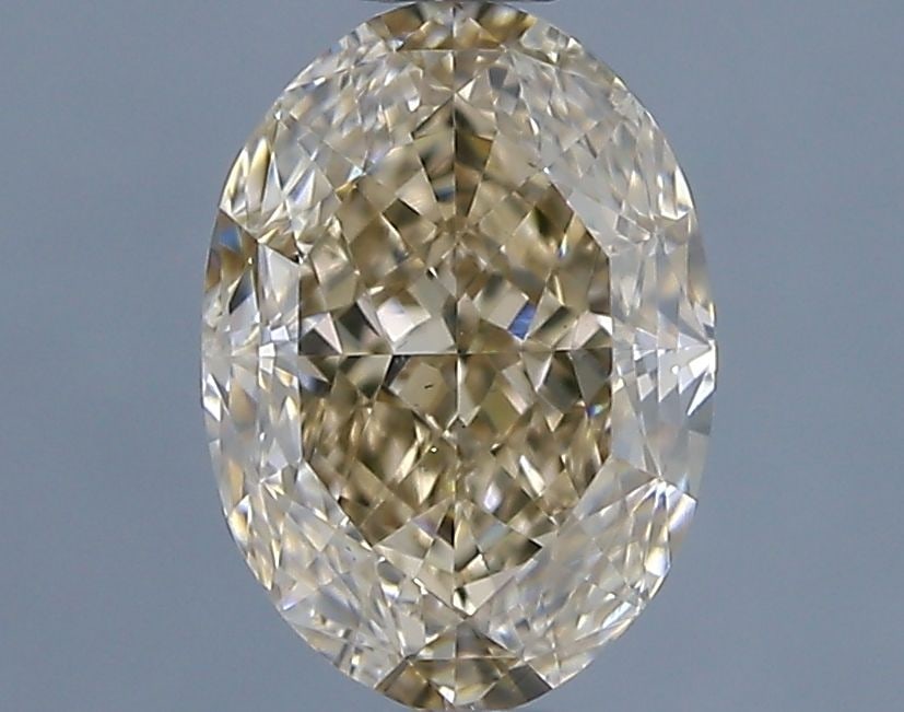Loose Diamond - OVAL 1.04ct Fancy Light Yellowish Brown VS2: Loose Diamond - OVAL 1.04ct Fancy Light Yellowish Brown VS2 Source: Natural Shape: OVAL Carats: 1.04 Color: Fancy Light Yellowish Brown Certification: GIA Video: