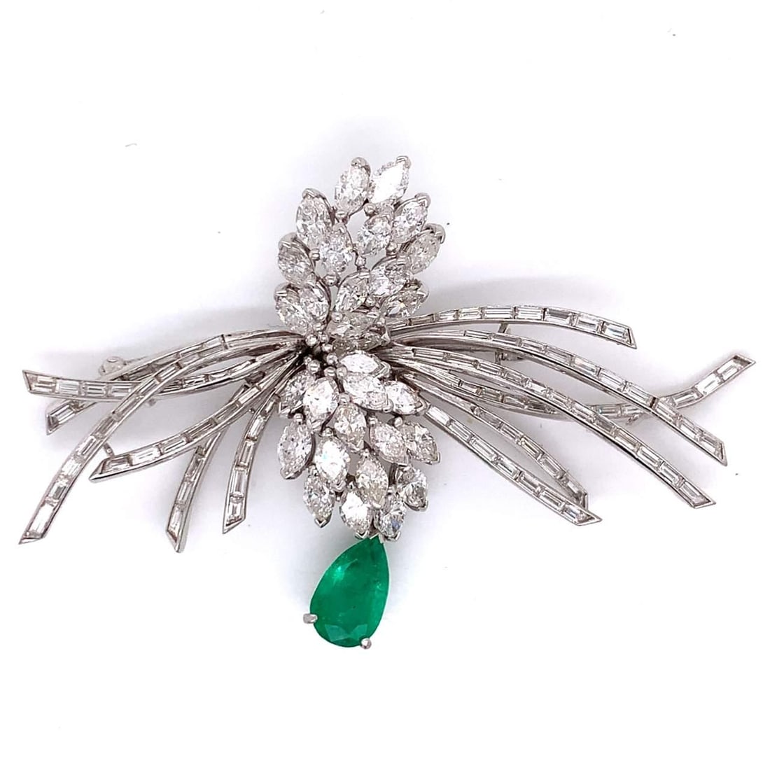 Vintage Platinum Brooch with 2.50 Ct Colombian Emerald and Diamonds: Vintage Platinum Brooch with 2.50 Ct Colombian Emerald and Diamonds This exquisite Vintage Platinum Diamond and Emerald Brooch showcases a stunning Colombian emerald weighing approximately 2.50 Ct, be