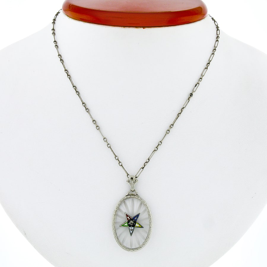 Art Deco 14k White Gold Camphor Glass Eastern Star Pendant With Enamel Masonic Symbol: Art Deco 14k White Gold Camphor Glass Eastern Star Pendant With Enamel Masonic Symbol Discover this exquisite Antique Art Deco pendant, meticulously crafted from solid 14k white gold. The captivating 