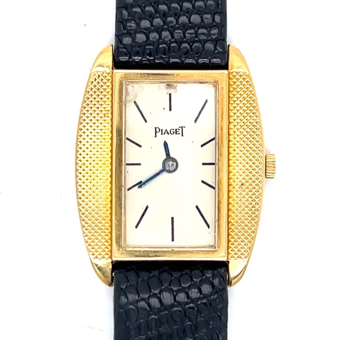 18K Yellow Gold Manual Wind Piaget Dress Watch 23mm Case: 18K Yellow Gold Manual Wind Piaget Dress Watch 23mm Case Elegant Piaget dress watch crafted from 18K yellow gold, featuring a 23mm case and manual winding movement. The watch measures 8 inches in leng