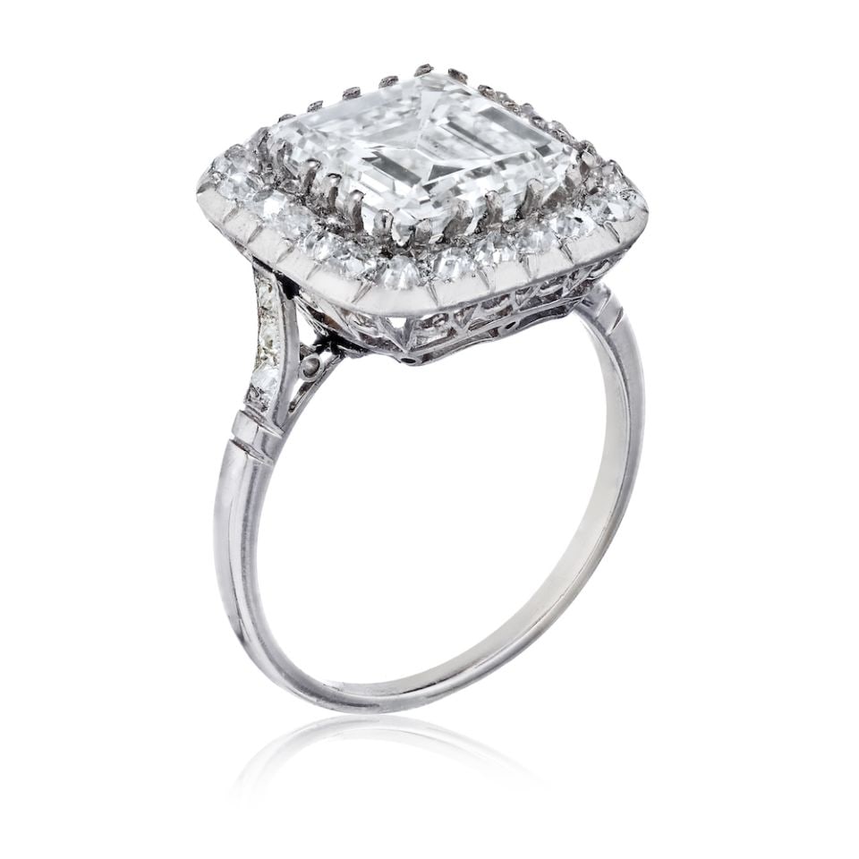 Vintage Platinum Engagement Ring with 4.02ct GIA G VVS1 Round Diamond: Vintage Platinum Engagement Ring with 4.02ct GIA G VVS1 Round Diamond This pre-owned ring is crafted in platinum and features a total diamond weight of 4.02 carats. The centerpiece is a 1.06 carat rou