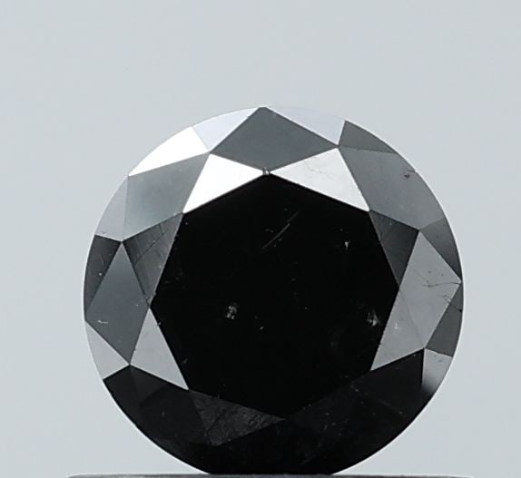 Loose Diamond - ROUND 0.7ct Fancy Black VS2: Loose Diamond - ROUND 0.7ct Fancy Black VS2 Source: Natural Shape: ROUND Carats: 0.7 Color: Fancy Black Certification: NONE Video: