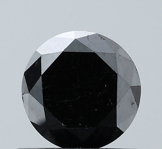 Loose Diamond - ROUND 0.77ct Fancy Black VS2: Loose Diamond - ROUND 0.77ct Fancy Black VS2 Source: Natural Shape: ROUND Carats: 0.77 Color: Fancy Black Certification: NONE Video: