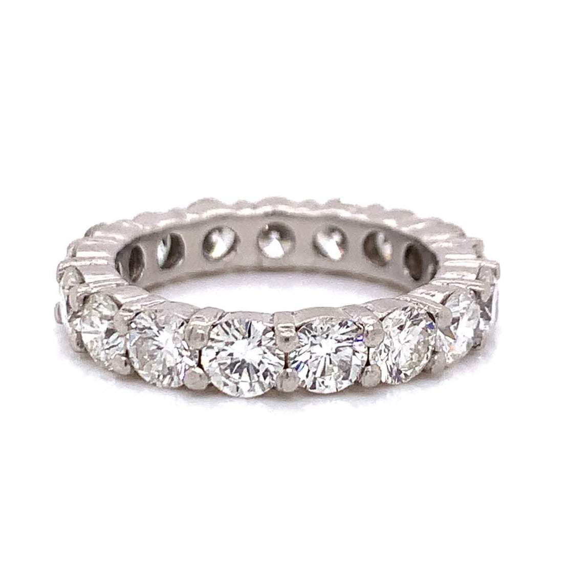 15 Diamond 6.50 Ct Eternity Band 14K White Gold: 15 Diamond 6.50 Ct Eternity Band 14K White Gold This stunning 6.50 Ct. Diamond Eternity Band features 15 exquisite diamonds, each contributing to the total weight of 6.50 Ct.* The diamonds are graded 