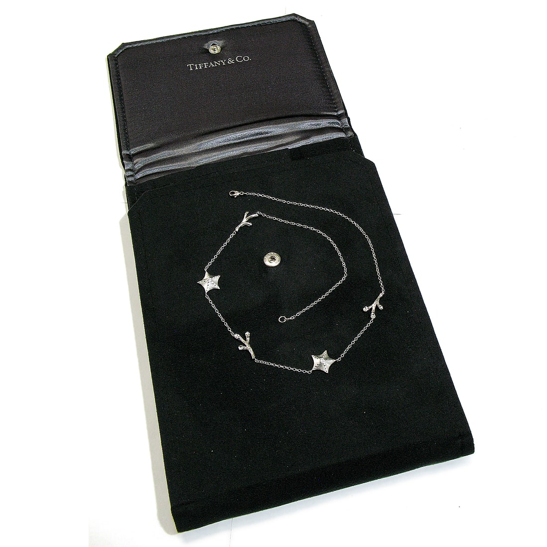 Tiffany & Co. 18k White Gold Diamond Starfish Jewelry Set with Earrings: Tiffany & Co. 18k White Gold Diamond Starfish Jewelry Set with Earrings Elevate your jewelry collection with this stunning Tiffany & Co. 18k Gold Diamond Starfish Station Necklace paired with exquisit
