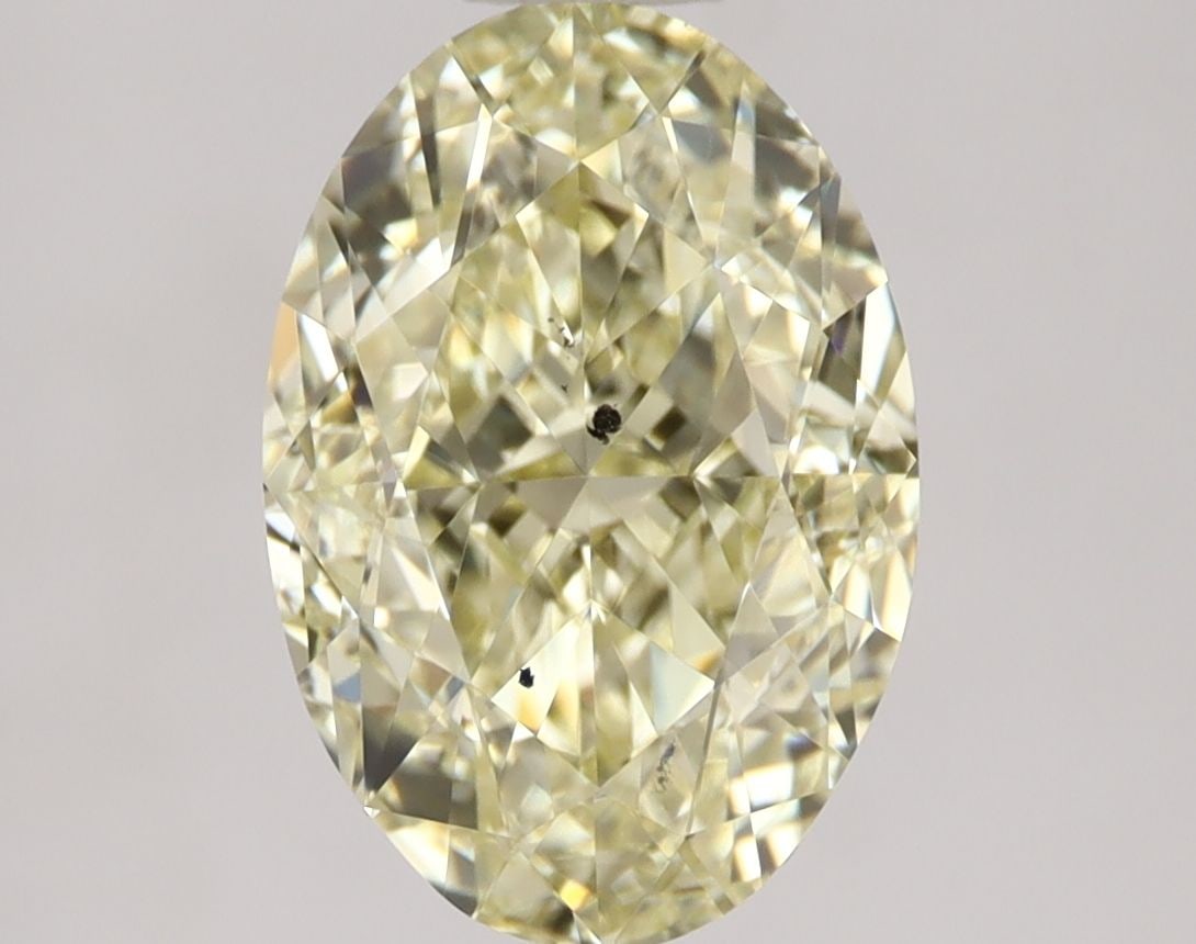 Loose Diamond - OVAL 2.01ct Fancy Yellow SI2: Loose Diamond - OVAL 2.01ct Fancy Yellow SI2 Source: Natural Shape: OVAL Carats: 2.01 Color: Fancy Yellow Certification: GIA Video: