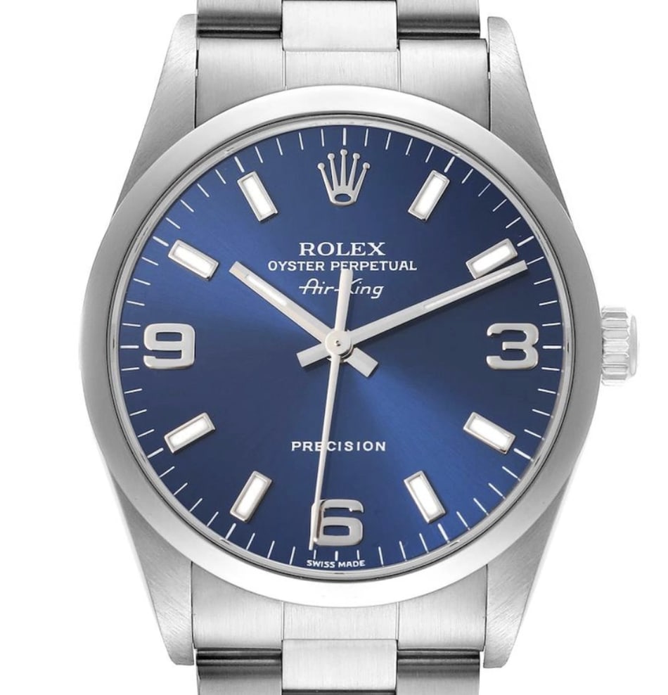 Oyster Bracelet Rolex Air-King 14000 Silver Dial Watch: Oyster Bracelet Rolex Air-King 14000 Silver Dial Watch This Rolex Air-King features a silver dial and a smooth bezel, complemented by an Oyster bracelet. It is designed as a unisex watch and is part o