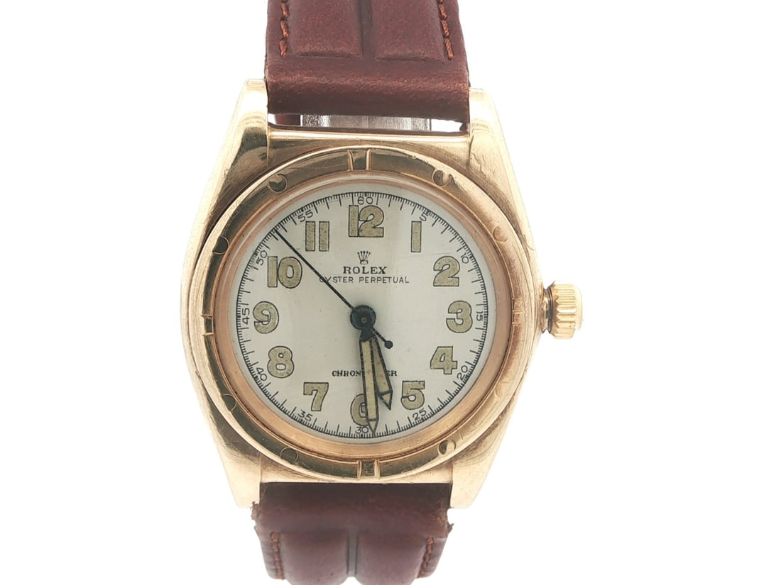 Rolex Oyster Perpetual Ref 3372 14k Gold Bubbleback 32mm Vintage 1940s Automatic Watch: Rolex Oyster Perpetual Ref 3372 14k Gold Bubbleback 32mm Vintage 1940s Automatic Watch This is a vintage 1940s Rolex Oyster Perpetual Bubbleback wristwatch, reference 3372, featuring a 32mm solid 14k 
