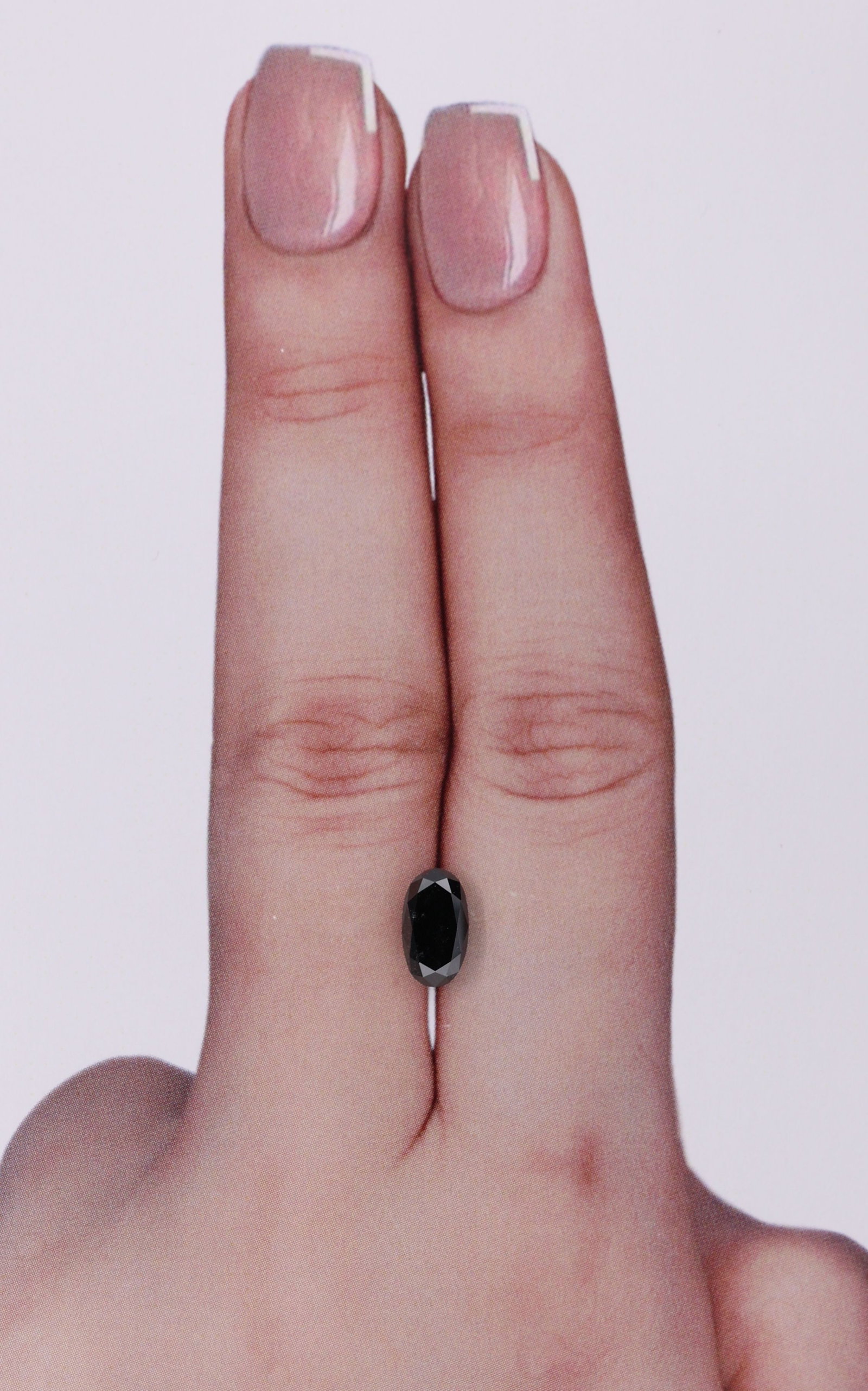 Loose Diamond - OVAL 0.99ct Black: Loose Diamond - OVAL 0.99ct Black Source: Natural Shape: OVAL Carats: 0.99 Color: Black Certification: IGI Video: