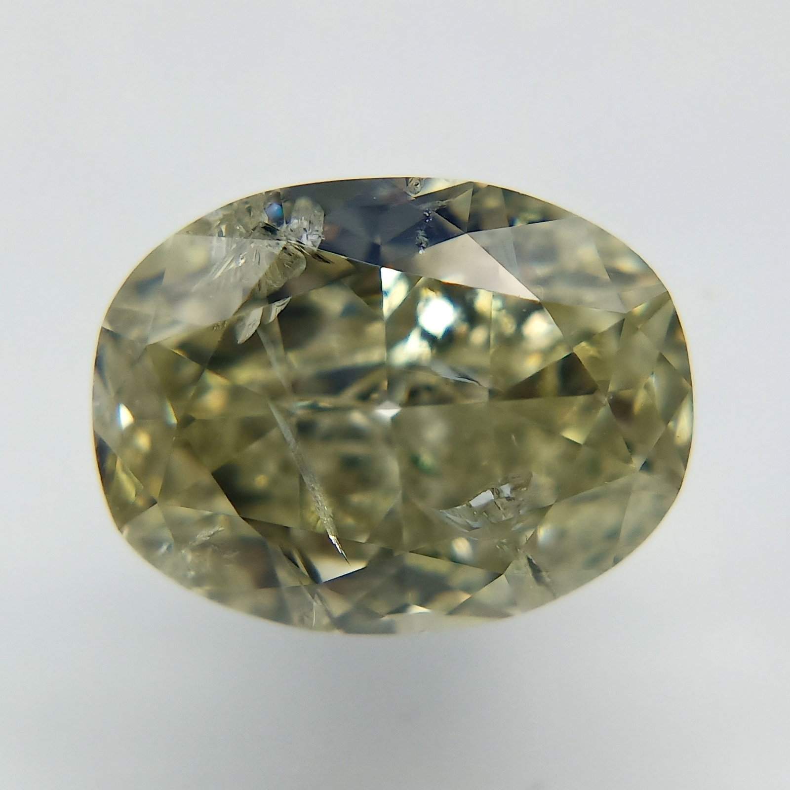 Loose Diamond - OVAL 1.51ct Fancy Brownish Greenish Yellow: Loose Diamond - OVAL 1.51ct Fancy Brownish Greenish Yellow Source: Natural Shape: OVAL Carats: 1.51 Color: Fancy Brownish Greenish Yellow Certification: GIA PLEASE NOTE: Framed, Large, or heavy items 