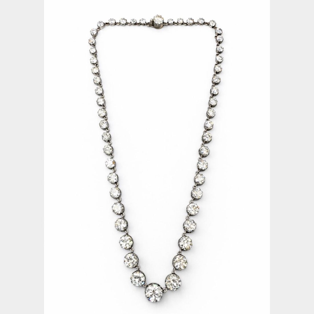 Graduated Diamond Necklace 34.55ct in 18K White Gold and Platinum 16 Inch: Graduated Diamond Necklace 34.55ct in 18K White Gold and Platinum 16 Inch This necklace features a graduated design set with 52 European-cut diamonds totaling approximately 34.55 carats, with I-K colo