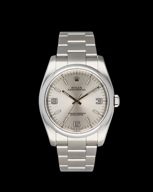 Rolex 116000 Oyster Perpetual Silver Dial Watch with Card 2015: Rolex 116000 Oyster Perpetual Silver Dial Watch with Card 2015 This is a men's Rolex Oyster Perpetual watch, reference number 116000, featuring a silver dial and smooth bezel. The timepiece comes with