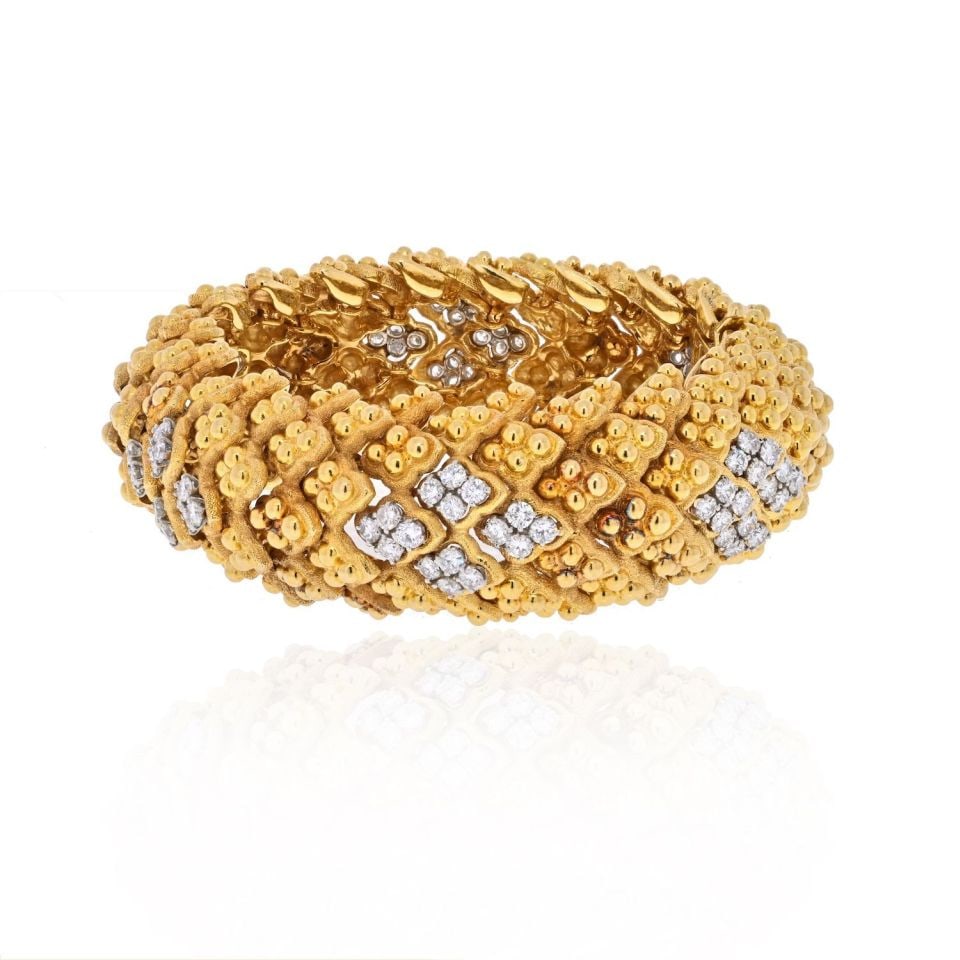 David Webb Wide Bracelet Platinum 18K Gold Textured Diamonds 9 Cts: David Webb Wide Bracelet Platinum 18K Gold Textured Diamonds 9 Cts This exquisite wide bracelet by David Webb showcases a striking combination of platinum and 18K yellow gold. The design features a di