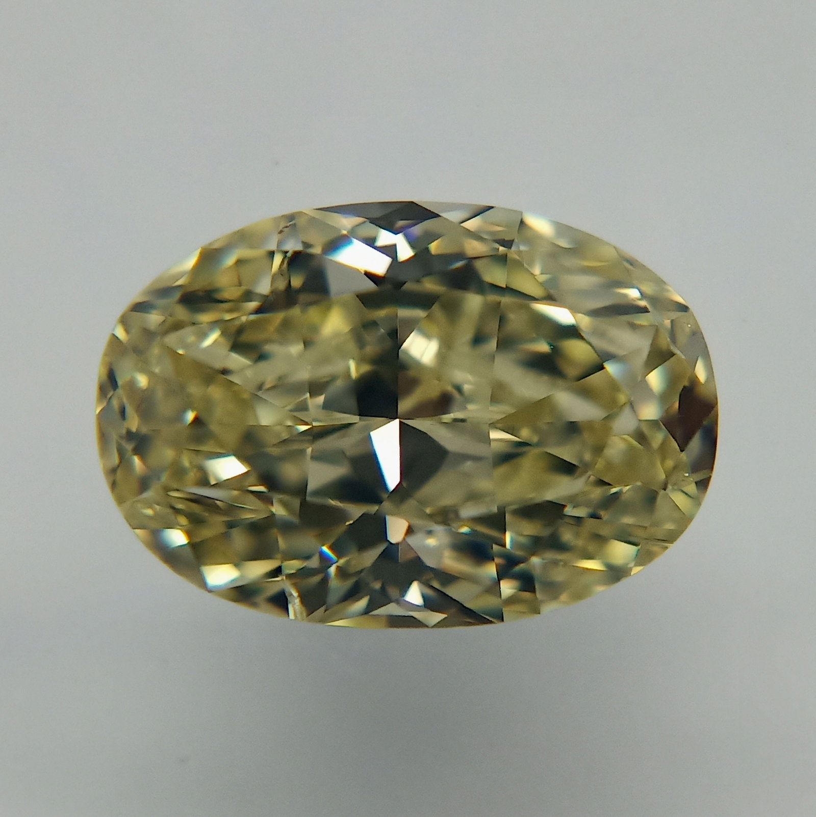 Loose Diamond - OVAL 1.0ct Fancy Light Yellow SI2: Loose Diamond - OVAL 1.0ct Fancy Light Yellow SI2 Source: Natural Shape: OVAL Carats: 1.0 Color: Fancy Light Yellow Certification: GIA PLEASE NOTE: Framed, Large, or heavy items do not have shipping c