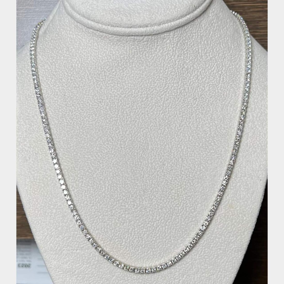 14K White Gold 175 Diamond 13.50 Ct Tennis Necklace: 14K White Gold 175 Diamond 13.50 Ct Tennis Necklace This exquisite tennis necklace is crafted from 14K white gold and features a stunning arrangement of 175 diamonds totaling approximately 13.50 carat